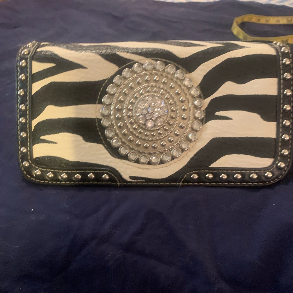 Ladies 3 fold wallet.